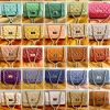 Leather small handbag with golden leather braided chain MM07